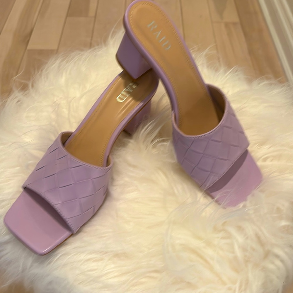 Purple RAID spring heels                Size 10US / 41 EUR